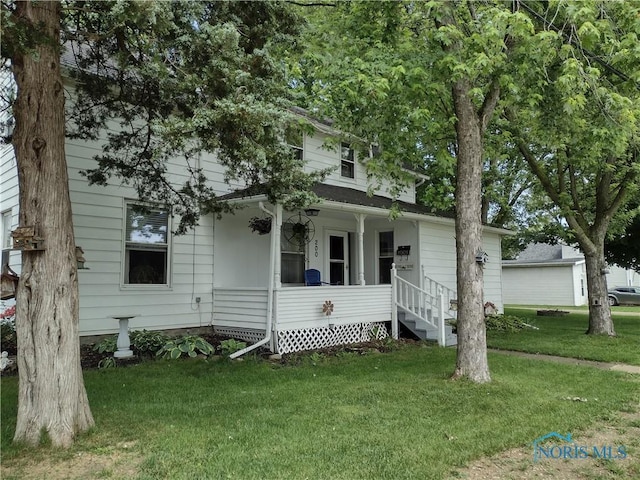 200 Pleasant St, Archbold, OH 43502 - view of front facade with a front lawn and a porch
