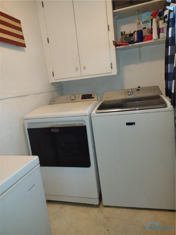 200 Pleasant St, Archbold, OH 43502 - laundry room featuring washing machine and clothes dryer and cabinet space