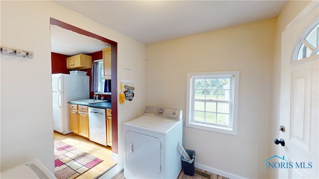 420 Ames St, Clyde, OH 43410 - laundry area with washer / dryer and light wood-style floors