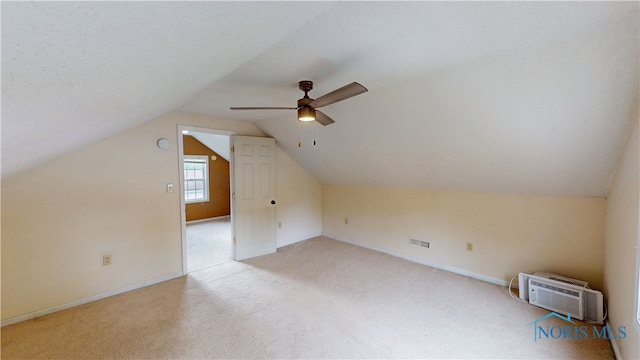 420 Ames St, Clyde, OH 43410 - bonus room with light carpet, vaulted ceiling, ceiling fan, and an AC wall unit