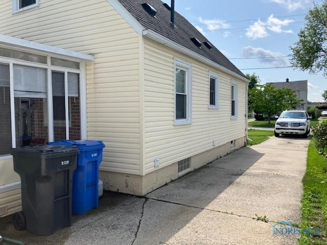 4614 290th St, Toledo, OH 43611 - view of property exterior with roof with shingles