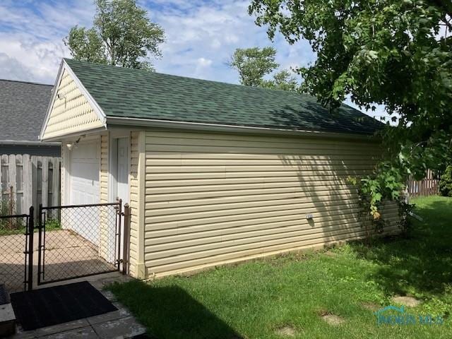 4614 290th St, Toledo, OH 43611 - view of outbuilding featuring a gate and a garage