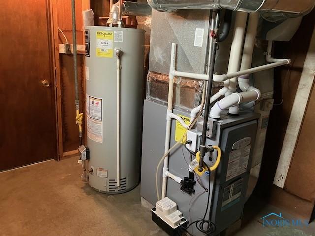 4614 290th St, Toledo, OH 43611 - utility room with water heater and heating unit