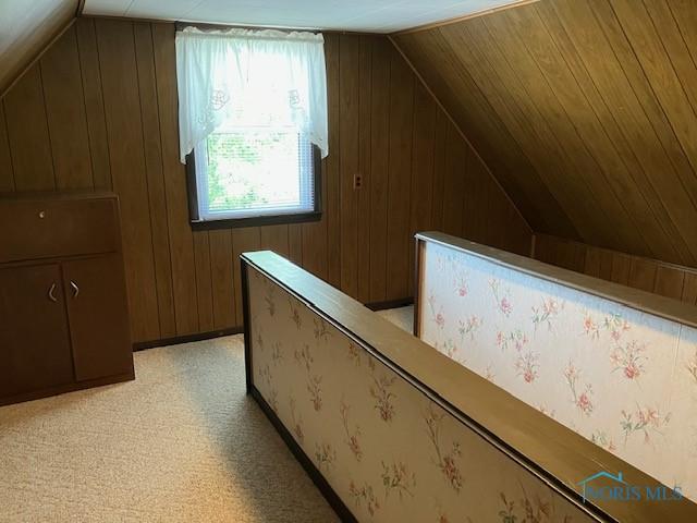 4614 290th St, Toledo, OH 43611 - bonus room featuring vaulted ceiling and wooden walls
