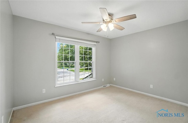 8076 Bridgehampton Dr, Waterville, OH 43566 - unfurnished room featuring light colored carpet and a ceiling fan