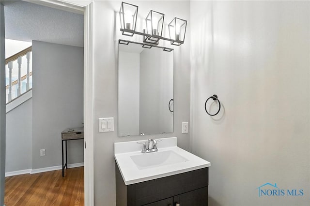 8076 Bridgehampton Dr, Waterville, OH 43566 - bathroom featuring wood finished floors and vanity