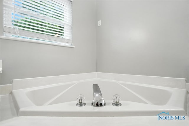 8076 Bridgehampton Dr, Waterville, OH 43566 - bathroom featuring a garden tub