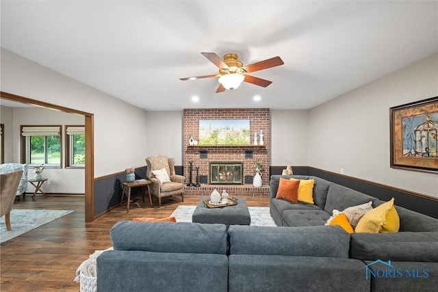 15180 Dirlam Rd, Bowling Green, OH 43402 - living area featuring dark wood-style floors, a ceiling fan, a fireplace, and recessed lighting