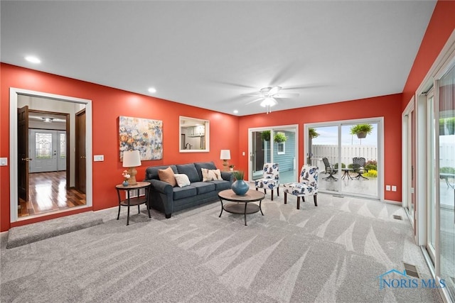 15180 Dirlam Rd, Bowling Green, OH 43402 - carpeted living room featuring plenty of natural light, recessed lighting, and ceiling fan