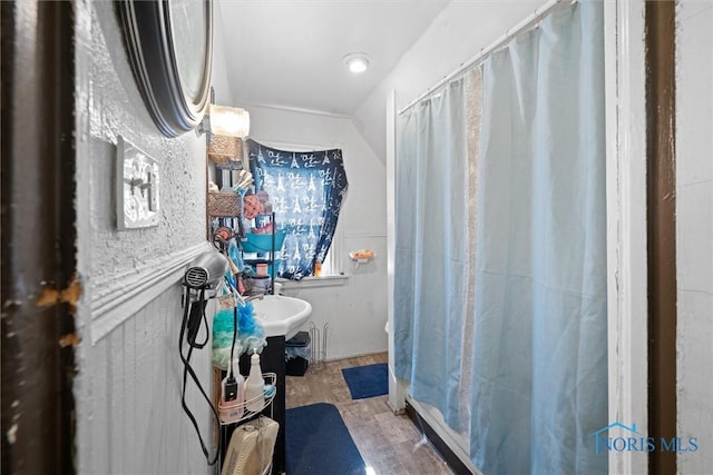 743 Clark St, Toledo, OH 43605 - full bathroom with wood finished floors, lofted ceiling, and curtained shower
