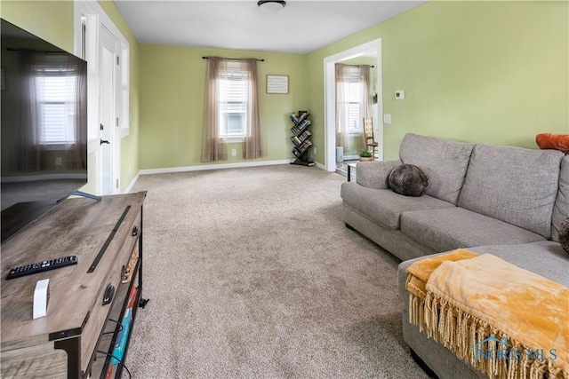 1130 Alger St, Fremont, OH 43420 - carpeted living room featuring baseboards