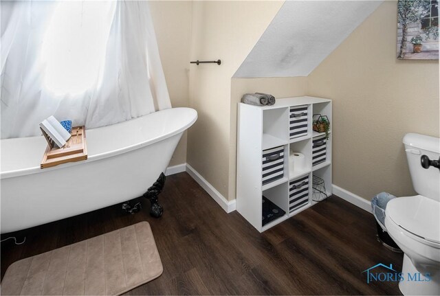 1130 Alger St, Fremont, OH 43420 - full bath with a soaking tub, wood finished floors, and heating unit