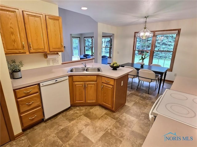 3901 Hampstead Dr Unit 3901, Sylvania, OH 43560 - kitchen featuring white dishwasher, a chandelier, a peninsula, light countertops, and range