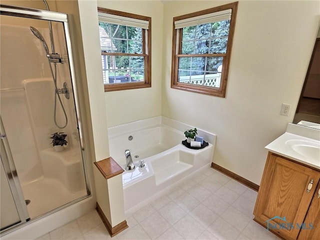 3901 Hampstead Dr Unit 3901, Sylvania, OH 43560 - bathroom with a stall shower, vanity, and a garden tub