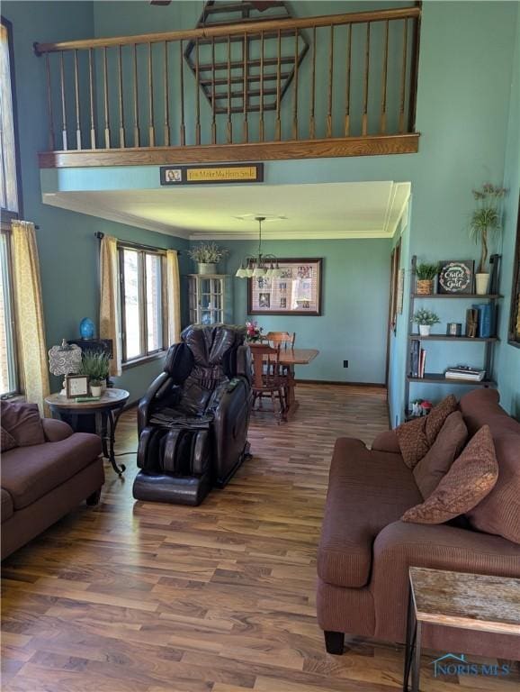16020 County Road D, Wauseon, OH 43567 - living room with a high ceiling, wood finished floors, and a chandelier