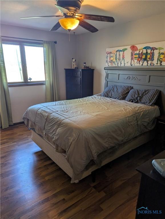 16020 County Road D, Wauseon, OH 43567 - bedroom featuring wood finished floors and ceiling fan