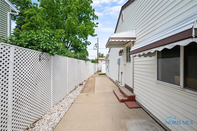 2521 Shallowford Dr, Toledo, OH 43611 - view of side of home with a patio area