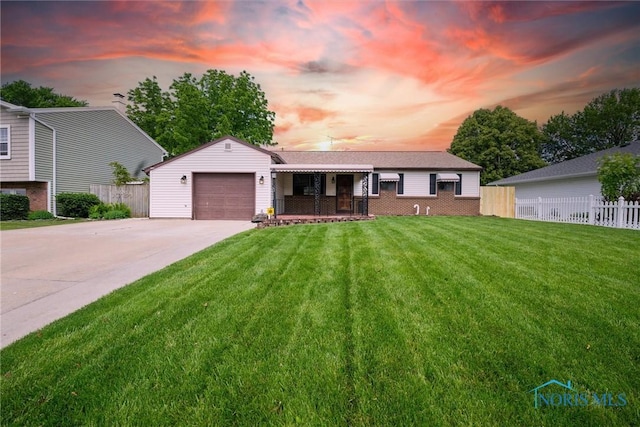 2521 Shallowford Dr, Toledo, OH 43611 - view of front of property featuring concrete driveway, an attached garage, and brick siding
