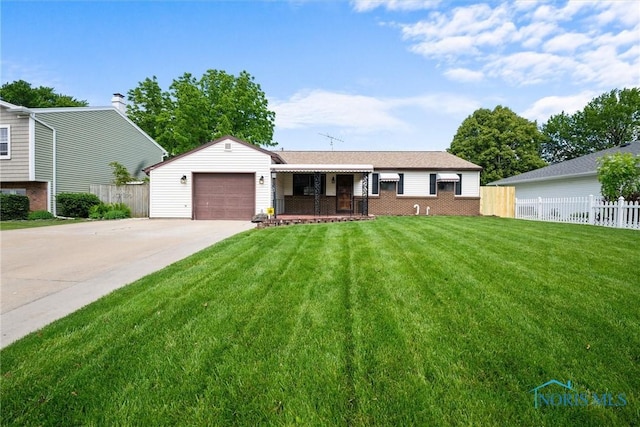 2521 Shallowford Dr, Toledo, OH 43611 - view of front facade with an attached garage, concrete driveway, and brick siding
