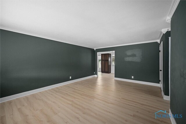 2521 Shallowford Dr, Toledo, OH 43611 - empty room featuring ornamental molding and wood finished floors