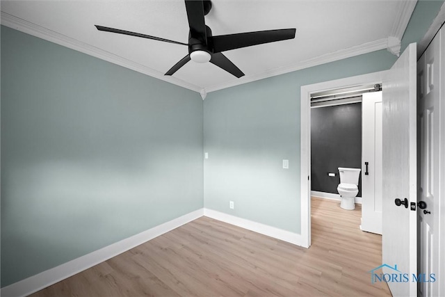 2521 Shallowford Dr, Toledo, OH 43611 - unfurnished bedroom featuring crown molding, light wood-style floors, and ceiling fan