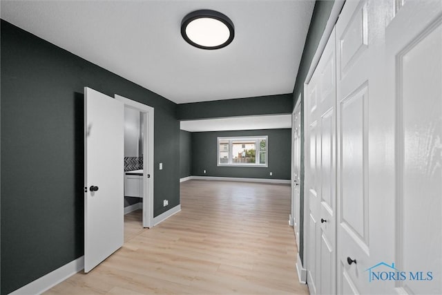 2521 Shallowford Dr, Toledo, OH 43611 - corridor featuring light wood finished floors and baseboards