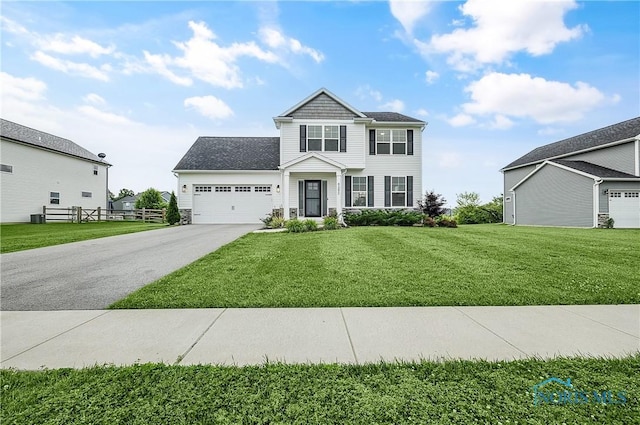 5352 Brint Crossing Blvd, Sylvania, OH 43560 - view of front facade featuring an attached garage, driveway, and stone siding
