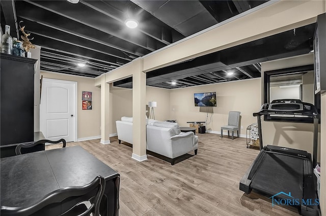 5352 Brint Crossing Blvd, Sylvania, OH 43560 - finished below grade area featuring light wood-style flooring and baseboards
