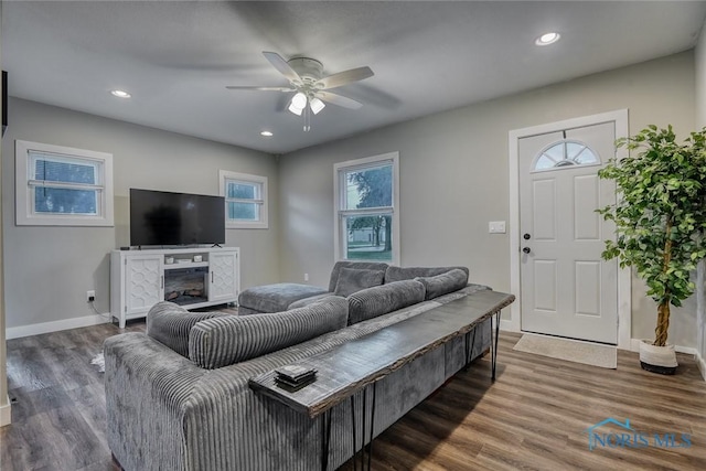 525 Western Ave, Findlay, OH 45840 - living room featuring ceiling fan, wood finished floors, recessed lighting, and a fireplace