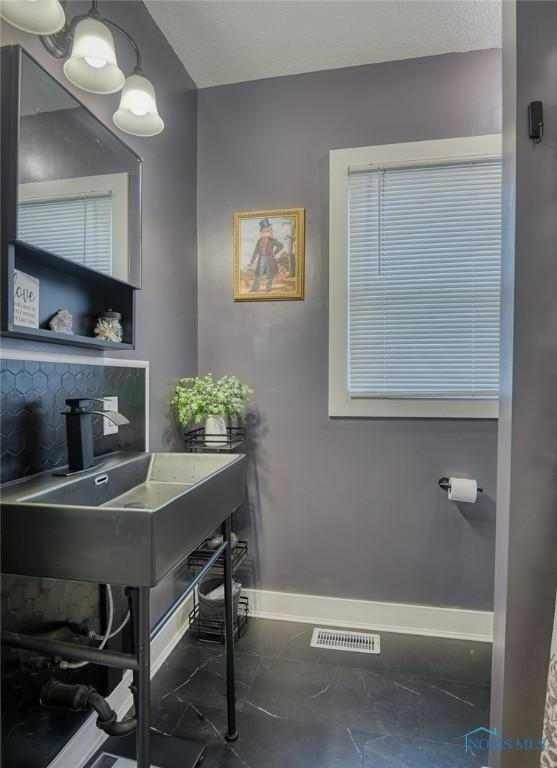 525 Western Ave, Findlay, OH 45840 - bathroom featuring baseboards