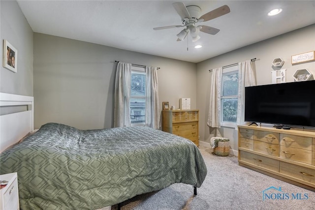 525 Western Ave, Findlay, OH 45840 - carpeted bedroom featuring multiple windows, ceiling fan, and recessed lighting