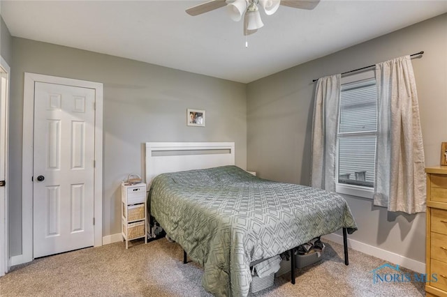 525 Western Ave, Findlay, OH 45840 - carpeted bedroom featuring baseboards and a ceiling fan