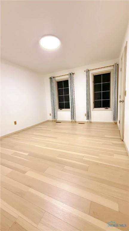 1303 Finch Dr, Bowling Green, OH 43402 - empty room with light wood finished floors and baseboards