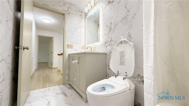 1303 Finch Dr, Bowling Green, OH 43402 - full bathroom with vanity and marble finish flooring