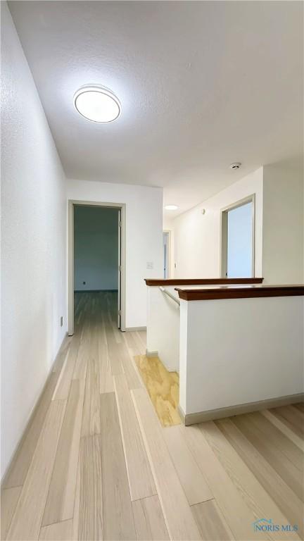 1303 Finch Dr, Bowling Green, OH 43402 - corridor featuring light wood-style flooring