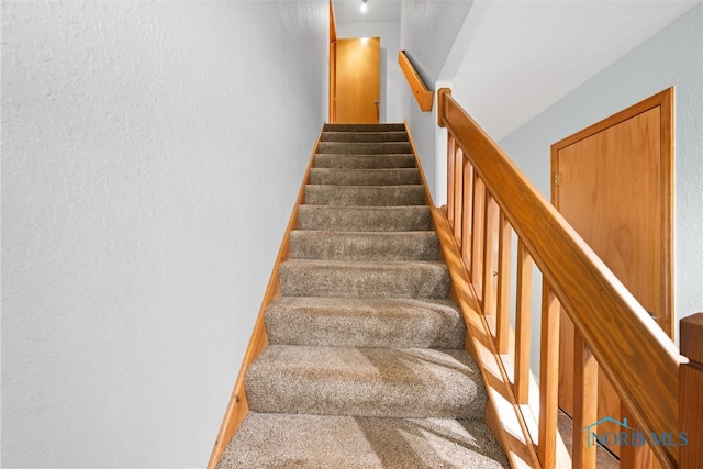 1528 Indian Creek Dr, Perrysburg, OH 43551 - stairs featuring a textured wall and carpet