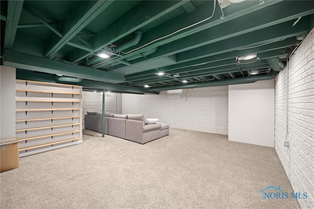 1528 Indian Creek Dr, Perrysburg, OH 43551 - finished basement with brick wall and carpet