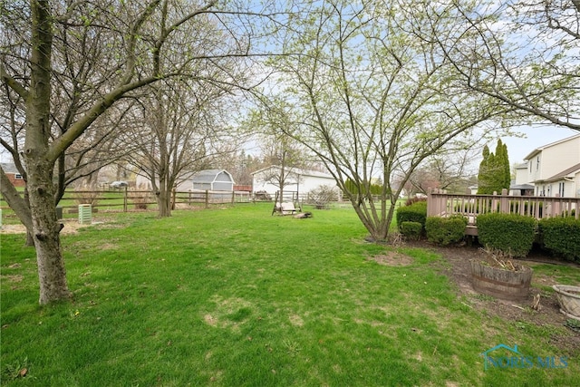 1528 Indian Creek Dr, Perrysburg, OH 43551 - view of yard with a wooden deck