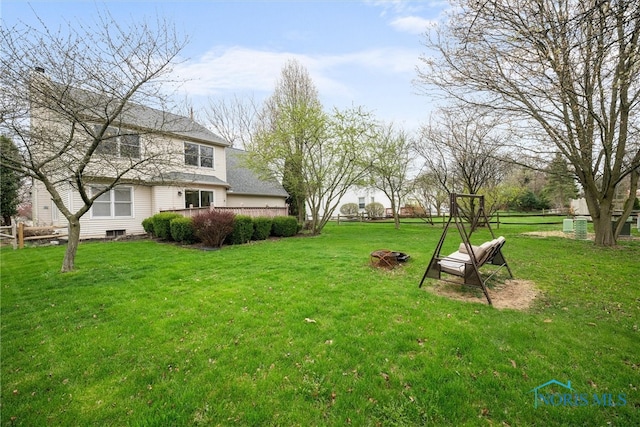 1528 Indian Creek Dr, Perrysburg, OH 43551 - view of green lawn with a deck
