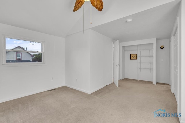 3133 126th St, Toledo, OH 43611 - unfurnished room with light carpet, a smoke detector, ceiling fan, and vaulted ceiling