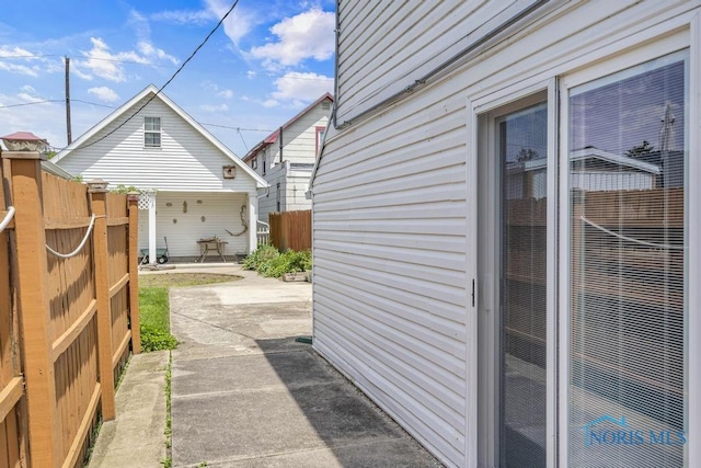 3133 126th St, Toledo, OH 43611 - view of home's exterior featuring a patio area