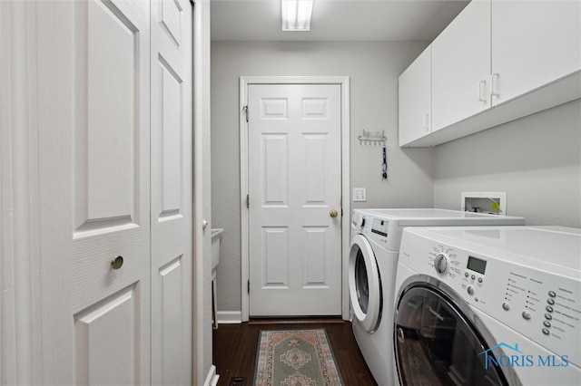 7713 Rome Ct, Holland, OH 43528 - laundry area featuring cabinet space, independent washer and dryer, and dark wood finished floors