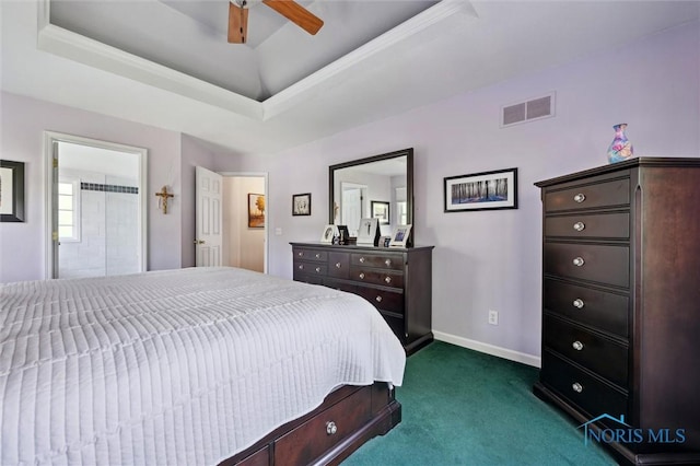 7713 Rome Ct, Holland, OH 43528 - bedroom with dark carpet, ceiling fan, a tray ceiling, and ensuite bathroom