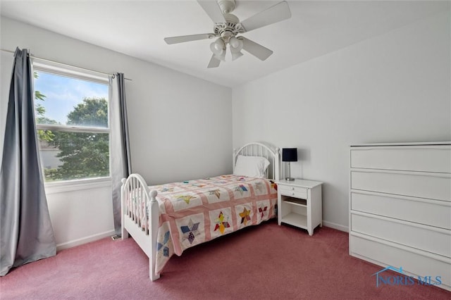7713 Rome Ct, Holland, OH 43528 - carpeted bedroom with multiple windows and a ceiling fan