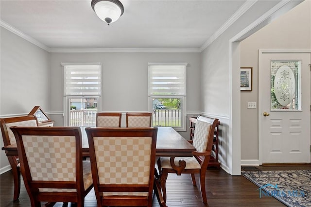 7713 Rome Ct, Holland, OH 43528 - dining space with dark wood finished floors and ornamental molding