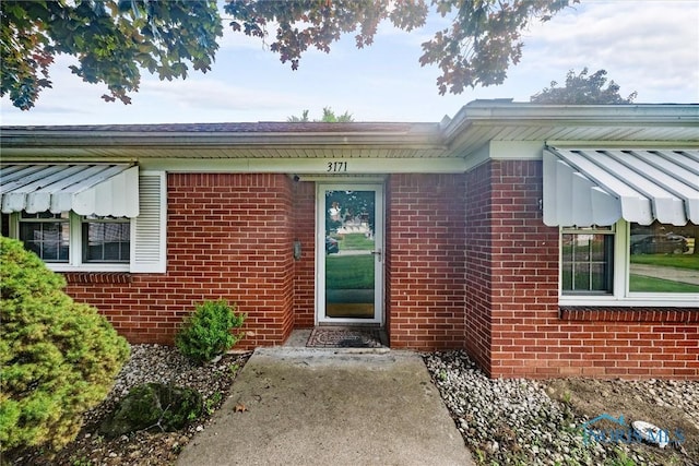 3171 Astor Ave, Toledo, OH 43614 - view of exterior entry with brick siding