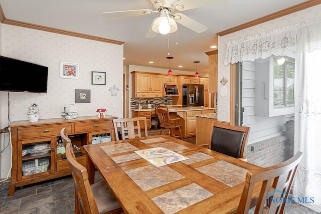 7325 Winsford Ln, Sylvania, OH 43560 - dining room with ornamental molding, ceiling fan, wallpapered walls, recessed lighting, and dark stone finish flooring