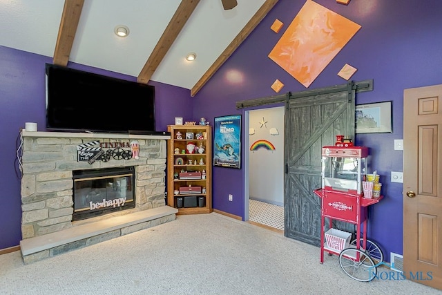 7325 Winsford Ln, Sylvania, OH 43560 - living area featuring a barn door, carpet, a stone fireplace, and recessed lighting