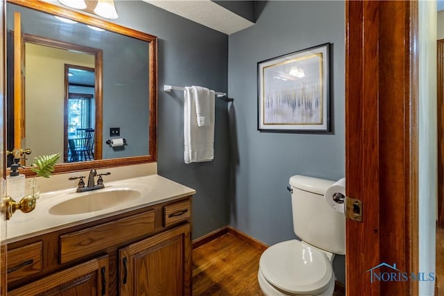 2325 Saint Roberts Ln, Toledo, OH 43617 - bathroom featuring vanity and wood finished floors