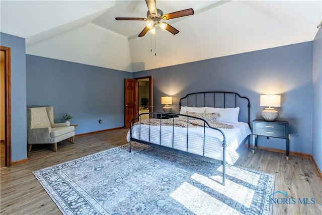 2325 Saint Roberts Ln, Toledo, OH 43617 - bedroom with wood finished floors, ceiling fan, and high vaulted ceiling